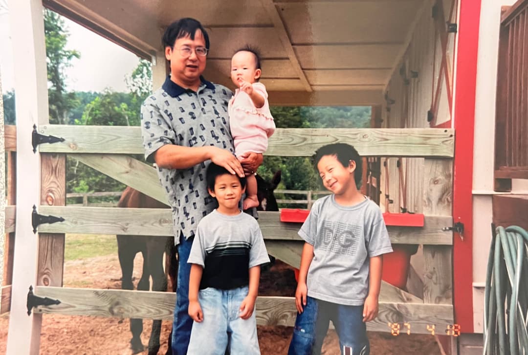 Charles Chow with family on the ranch